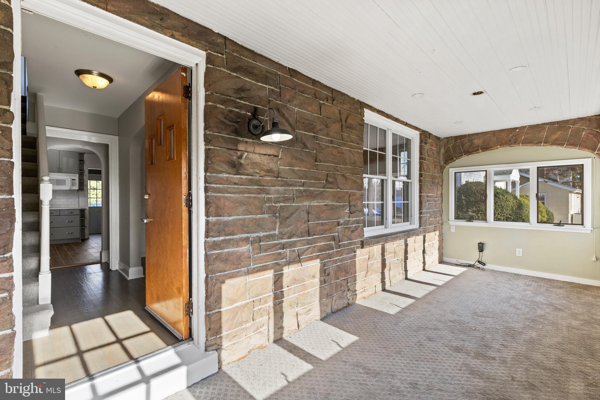 Enclosed front porch