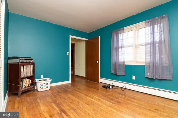 wooden floor and chair in a room