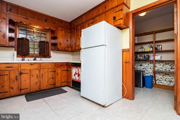 a utility room with cabinets