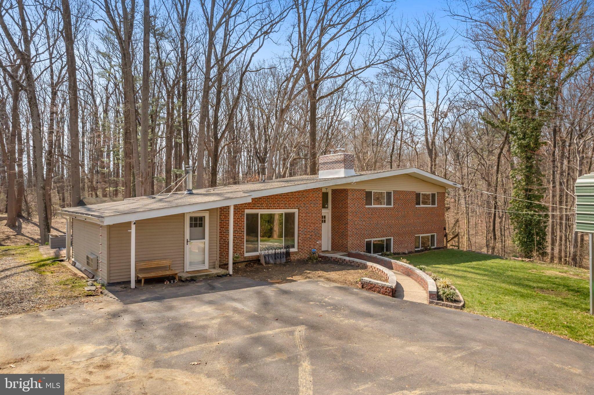 352 South New Middletown Road Media, PA 19063 - Photo 3 of 41 a front view of a house with a yard