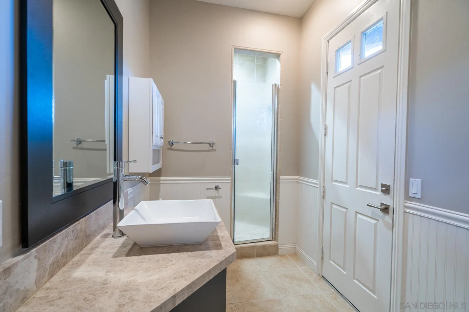 14184 Ridge Canyon Road Valley Center, CA 92082 - Photo 19 of 39 a bathroom with a granite countertop sink