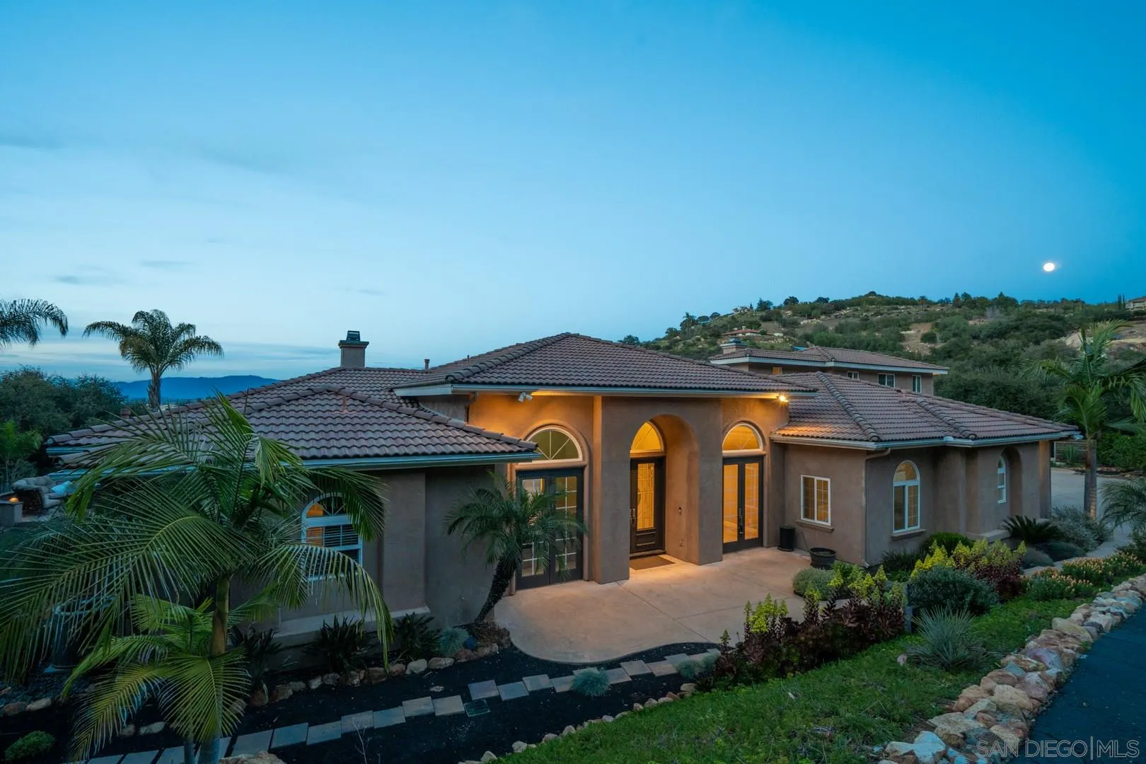 14184 Ridge Canyon Road Valley Center, CA 92082 - Photo 24 of 39 a front view of house with a garden