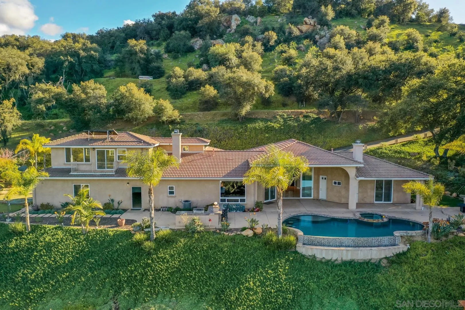 14184 Ridge Canyon Road Valley Center, CA 92082 - Photo 35 of 39 a front view of house with yard and green space