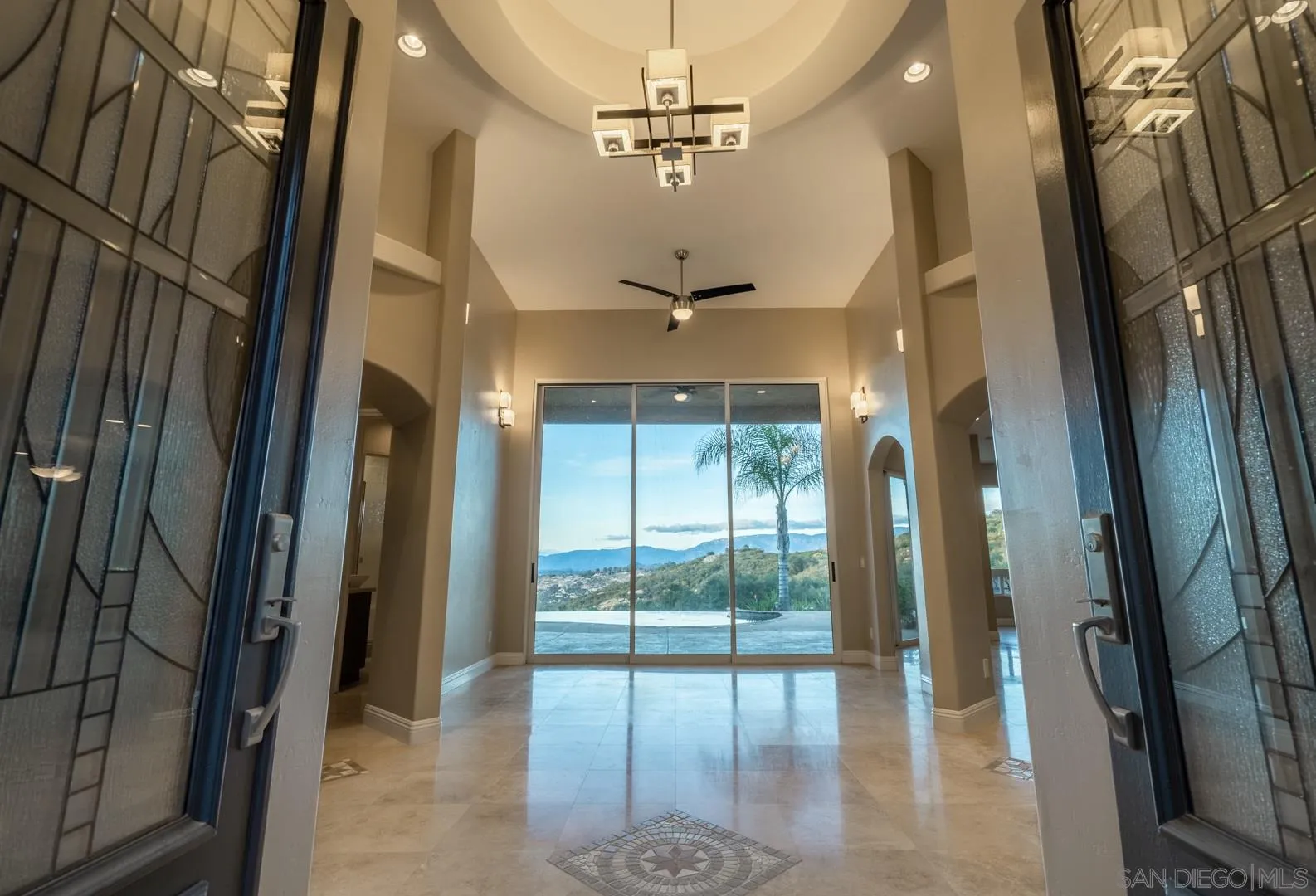 14184 Ridge Canyon Road Valley Center, CA 92082 - Photo 8 of 39 a view of a hallway with windows