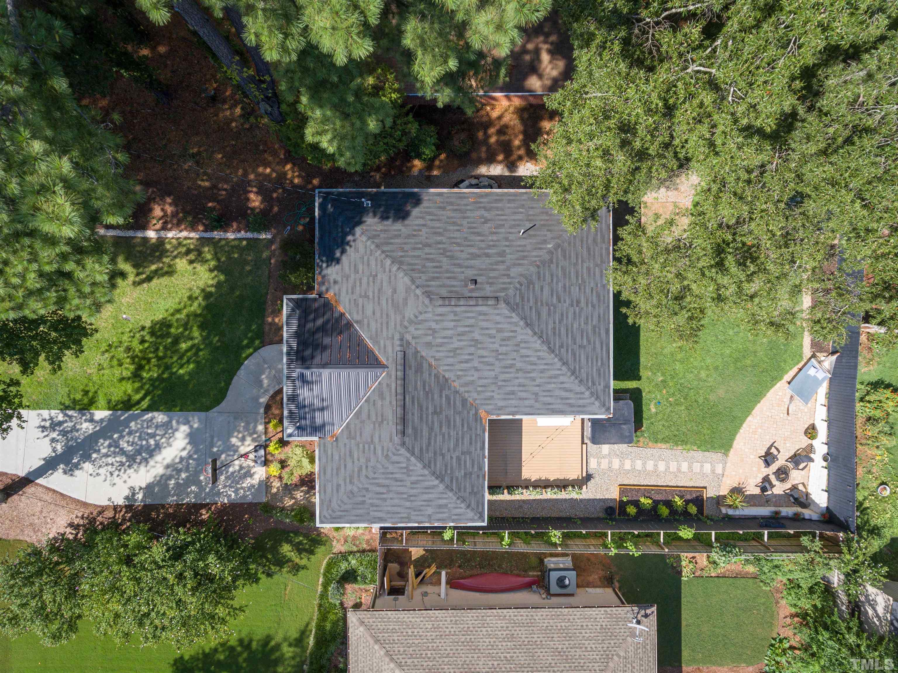 2116 Bellaire Avenue Raleigh, NC 27608 - Photo 3 of 26 an aerial view of a house with a yard basket ball court and outdoor seating