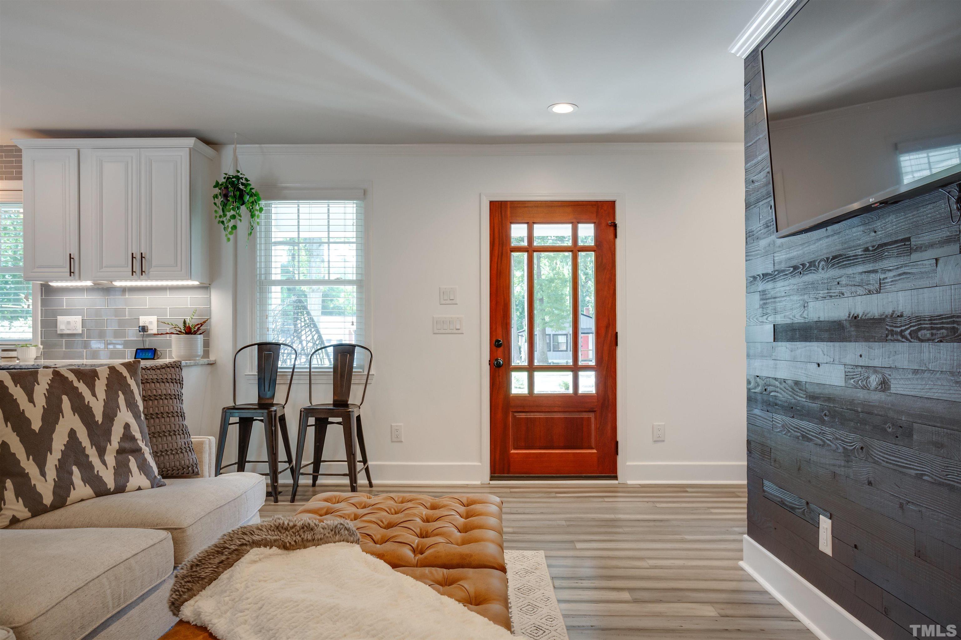 2116 Bellaire Avenue Raleigh, NC 27608 - Photo 4 of 26 a living room with furniture and a window