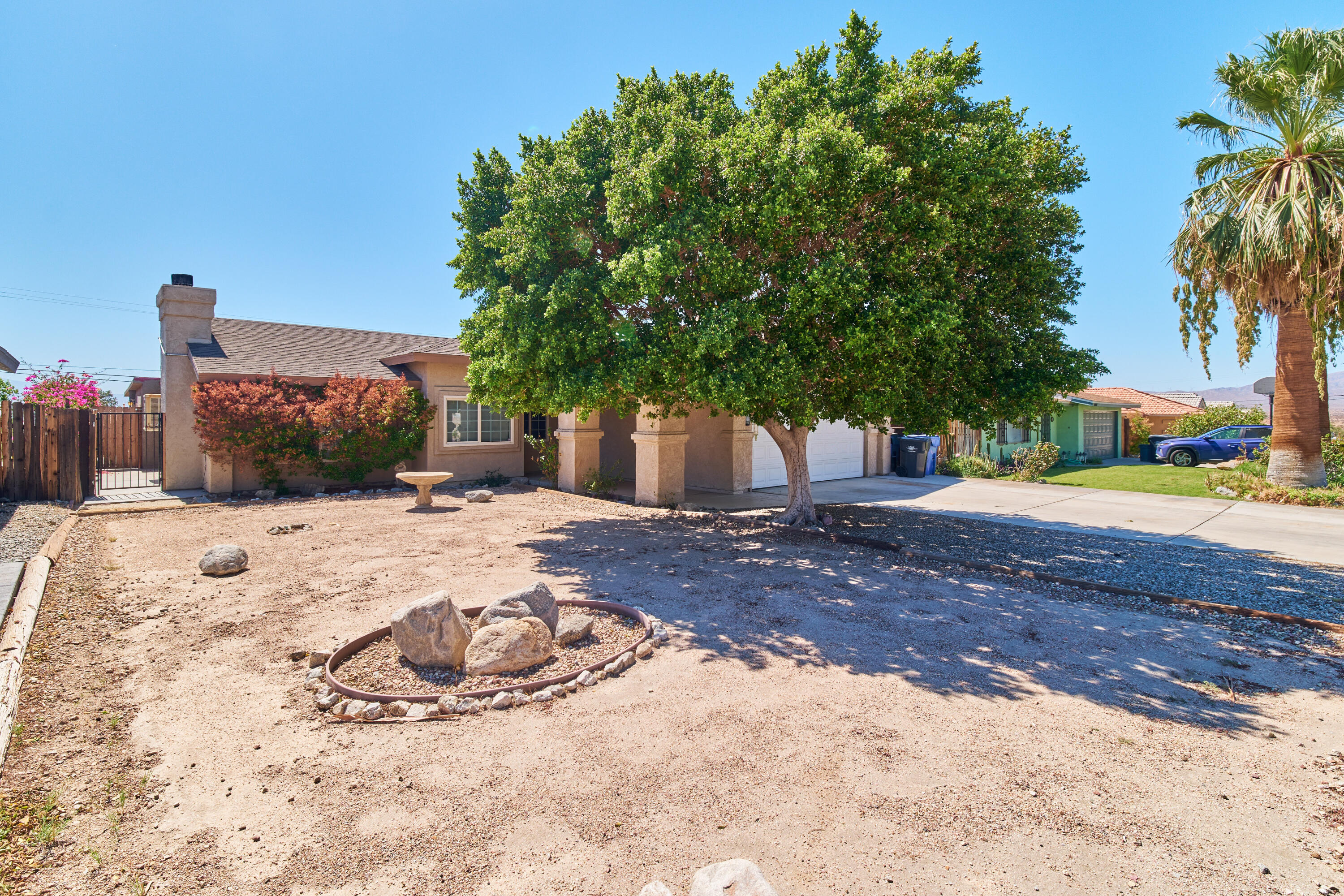 66097 San Jose Road Desert Hot Springs, CA 92240 - Photo 2 of 26 a view of a backyard of the house