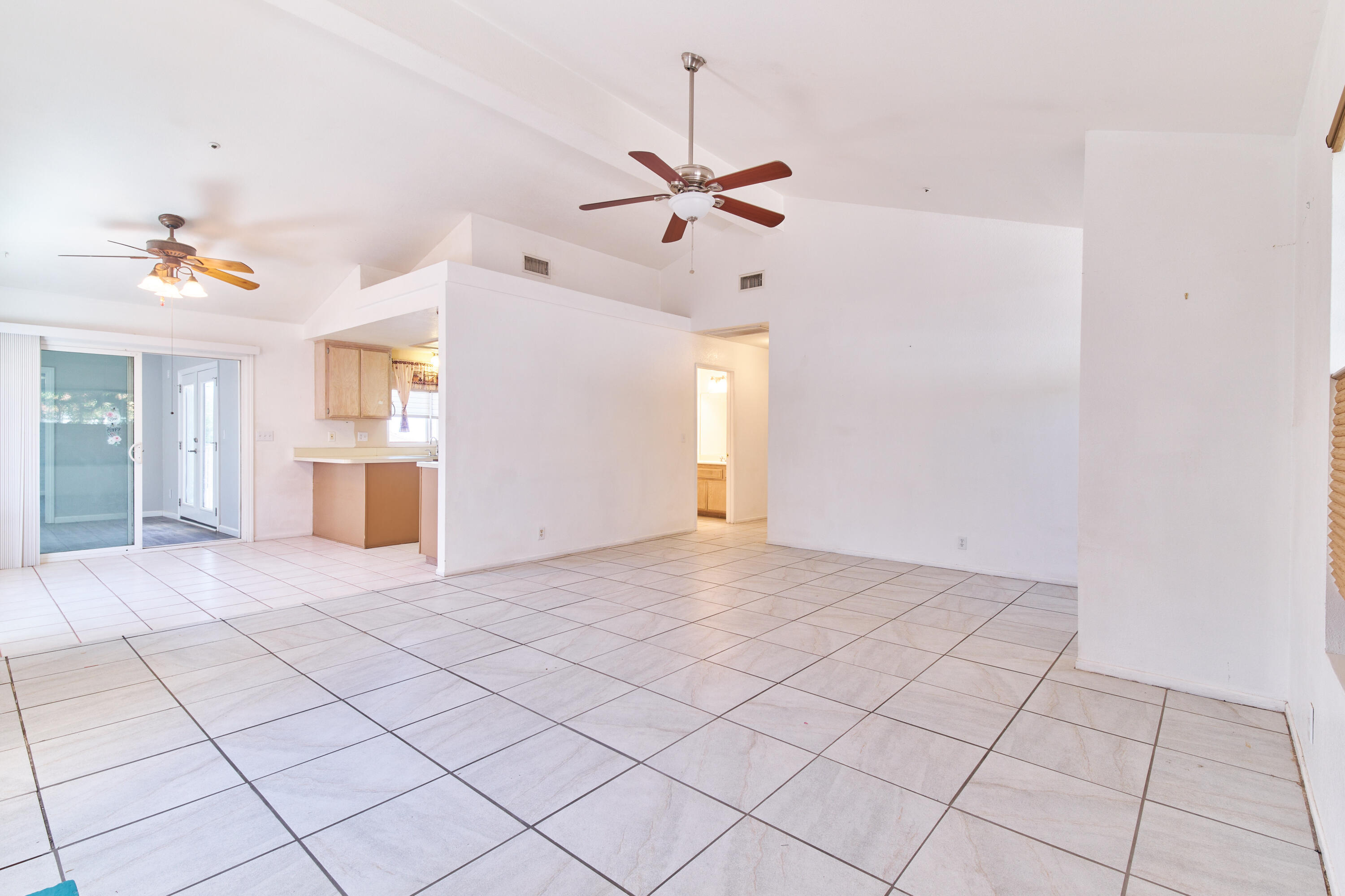 66097 San Jose Road Desert Hot Springs, CA 92240 - Photo 5 of 26 a view of an empty room with a window
