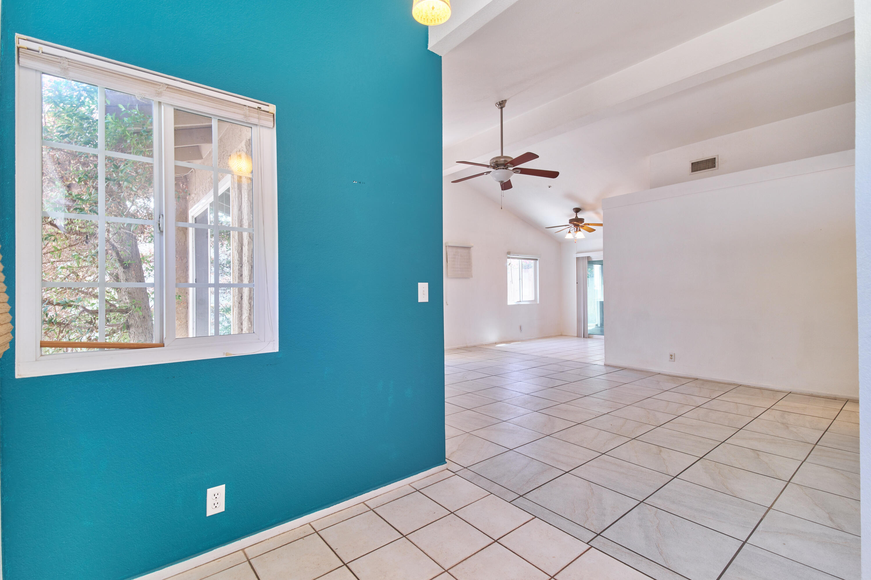 66097 San Jose Road Desert Hot Springs, CA 92240 - Photo 6 of 26 a view interior of a house with an empty space and a window