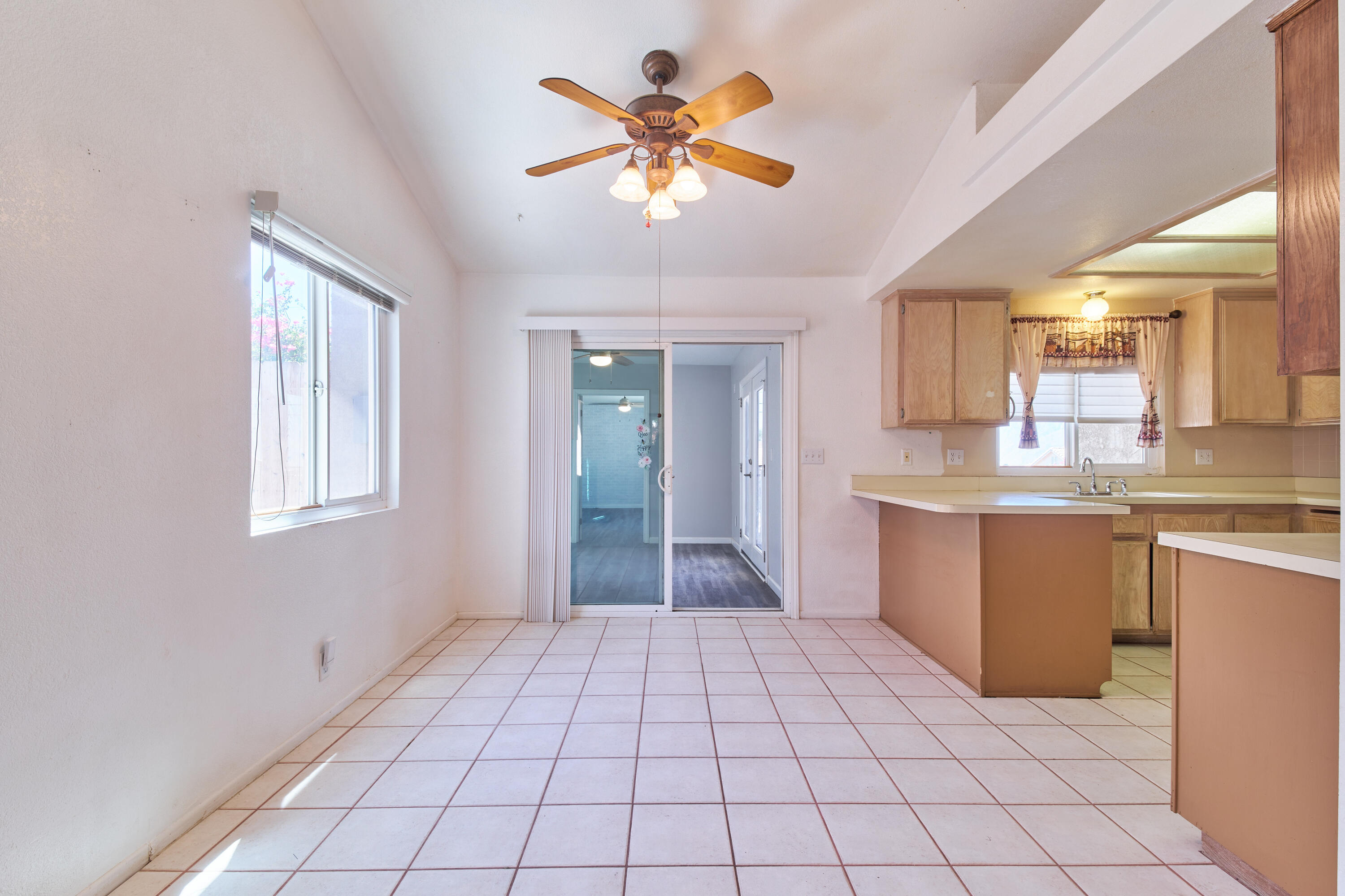 66097 San Jose Road Desert Hot Springs, CA 92240 - Photo 7 of 26 a view of an empty room with window and cabinet