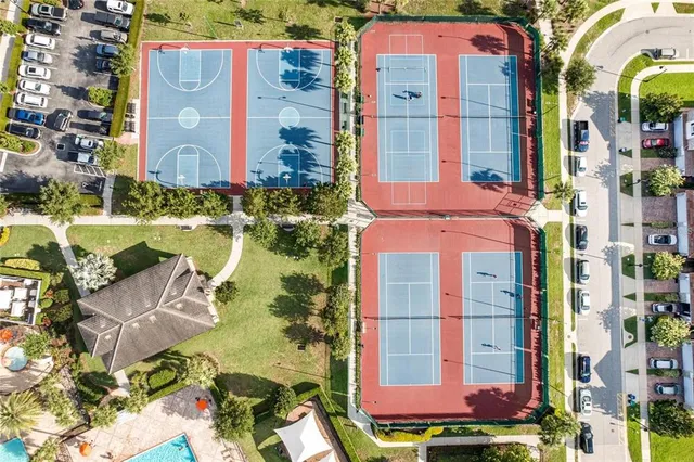 an aerial view of residential houses with outdoor space