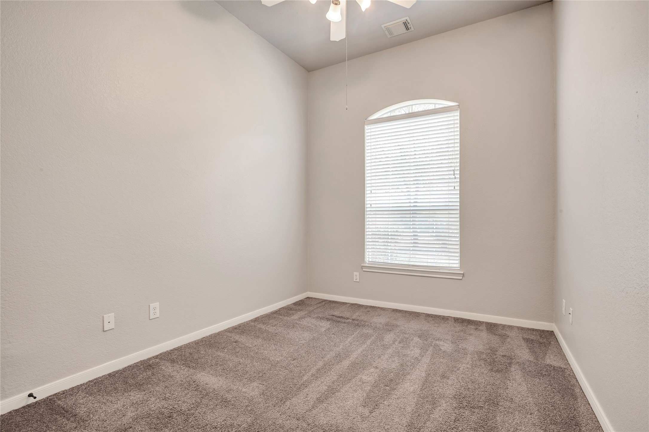27 Planchard Court Spring, TX 77382 - Photo 10 of 16 an empty room with a window