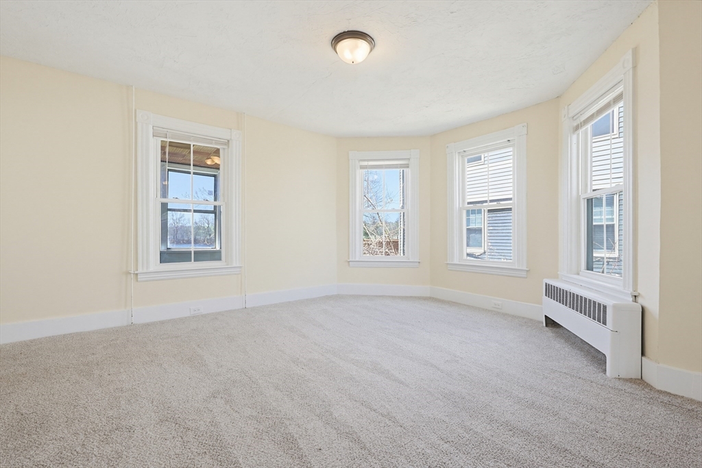 119 Hope Avenue Worcester, MA 01603 - Photo 14 of 42 a view of an empty room with a window
