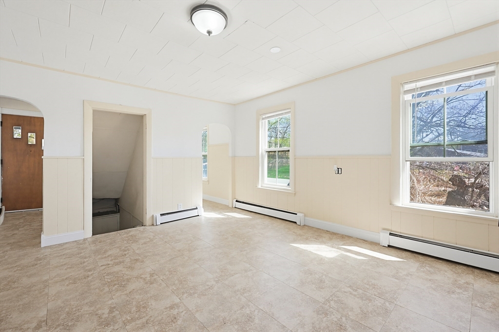 119 Hope Avenue Worcester, MA 01603 - Photo 15 of 42 an empty room with windows