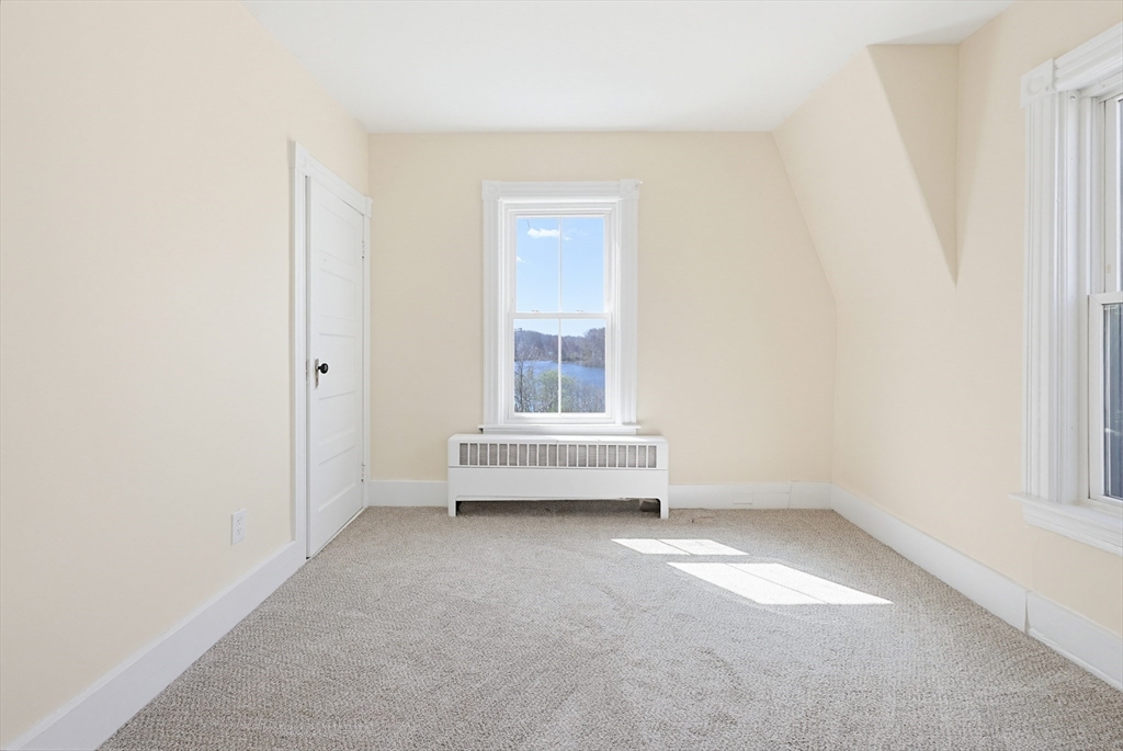 119 Hope Avenue Worcester, MA 01603 - Photo 17 of 42 an empty room with windows