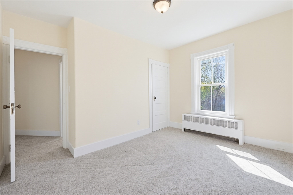 119 Hope Avenue Worcester, MA 01603 - Photo 18 of 42 a view of room with air conditioner and windows