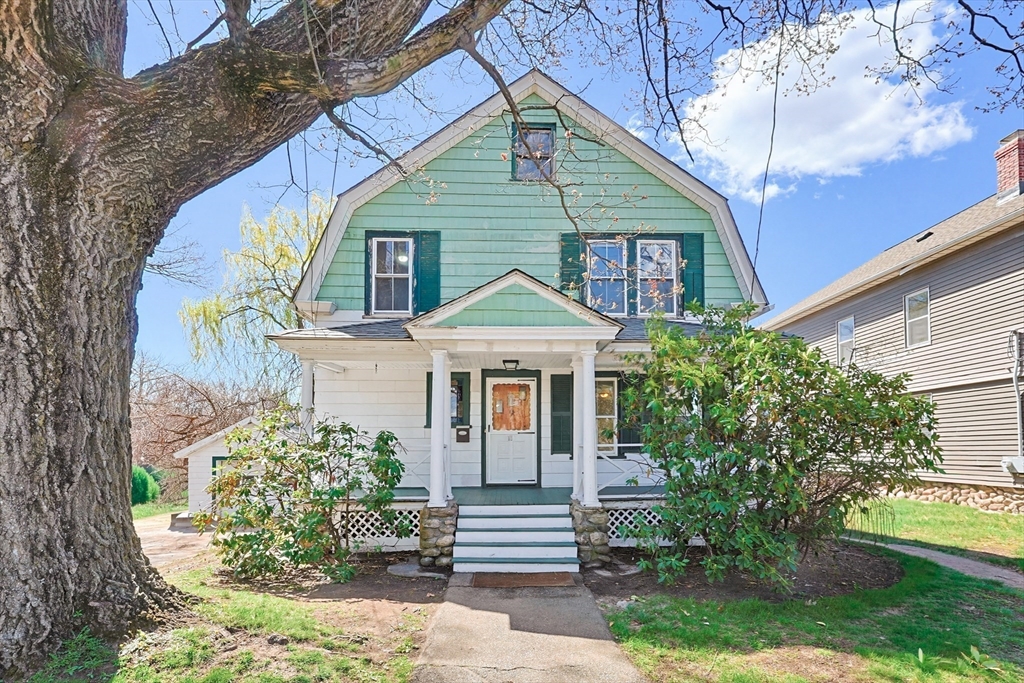 119 Hope Avenue Worcester, MA 01603 - Photo 2 of 42 a front view of a house with garden