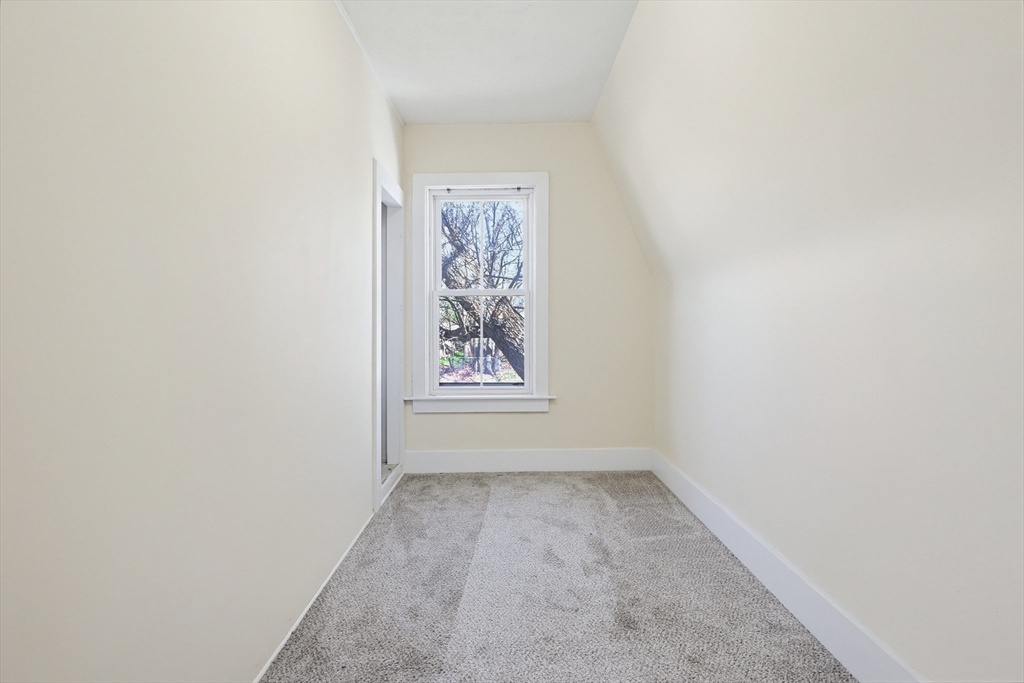 119 Hope Avenue Worcester, MA 01603 - Photo 21 of 42 an empty room with a window