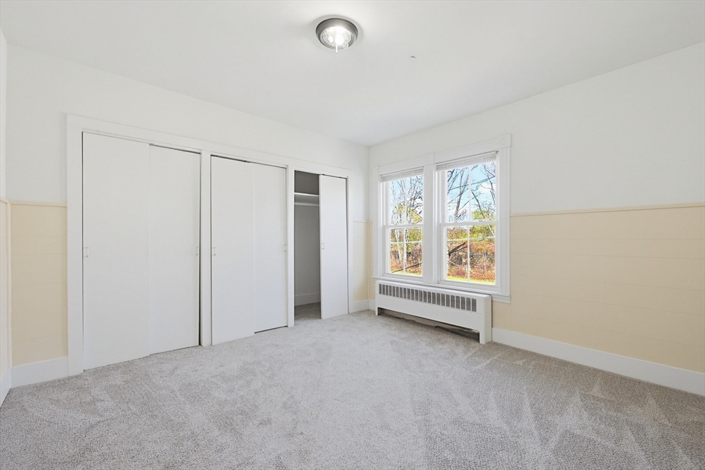 119 Hope Avenue Worcester, MA 01603 - Photo 23 of 42 an empty room with windows