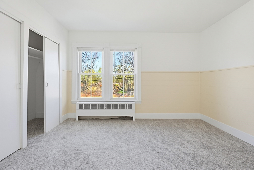119 Hope Avenue Worcester, MA 01603 - Photo 24 of 42 an empty room with windows