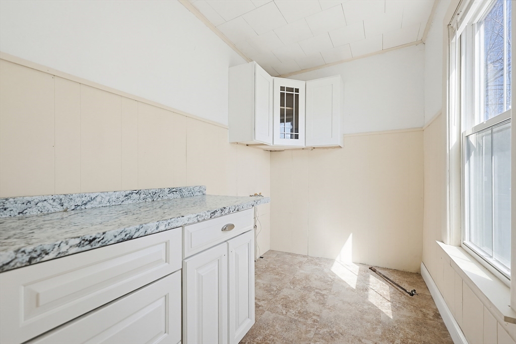 119 Hope Avenue Worcester, MA 01603 - Photo 25 of 42 a view of cabinets with wooden floor
