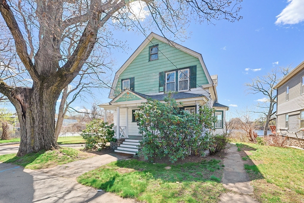 119 Hope Avenue Worcester, MA 01603 - Photo 38 of 42 a front view of a house with a yard