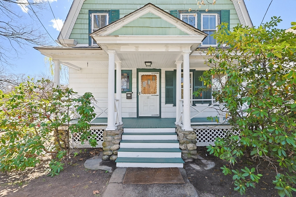 119 Hope Avenue Worcester, MA 01603 - Photo 40 of 42 a front view of a house with a garden