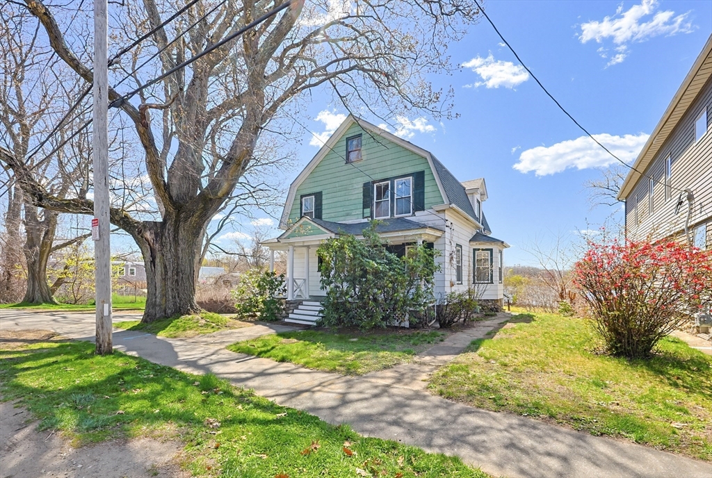 119 Hope Avenue Worcester, MA 01603 - Photo 42 of 42 a front view of a house with garden