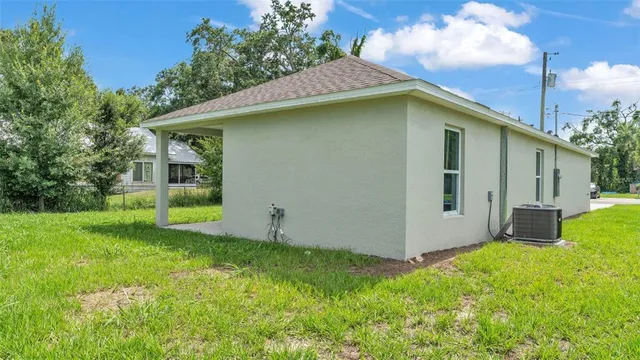 a view of a backyard with a garden