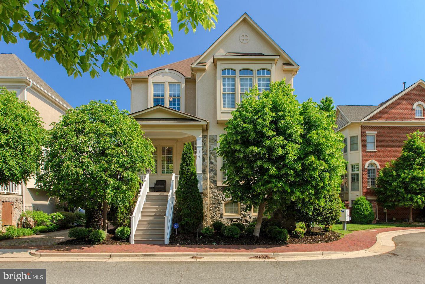 5007 John Ticer Drive Alexandria, VA 22304 - Photo 1 of 70 a front view of a house with a yard