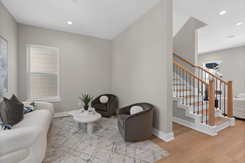 a living room with furniture windows