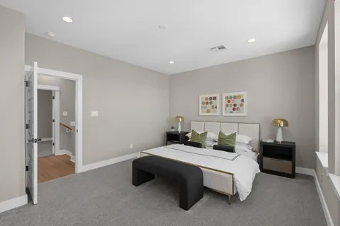 a bedroom with furniture and a couch