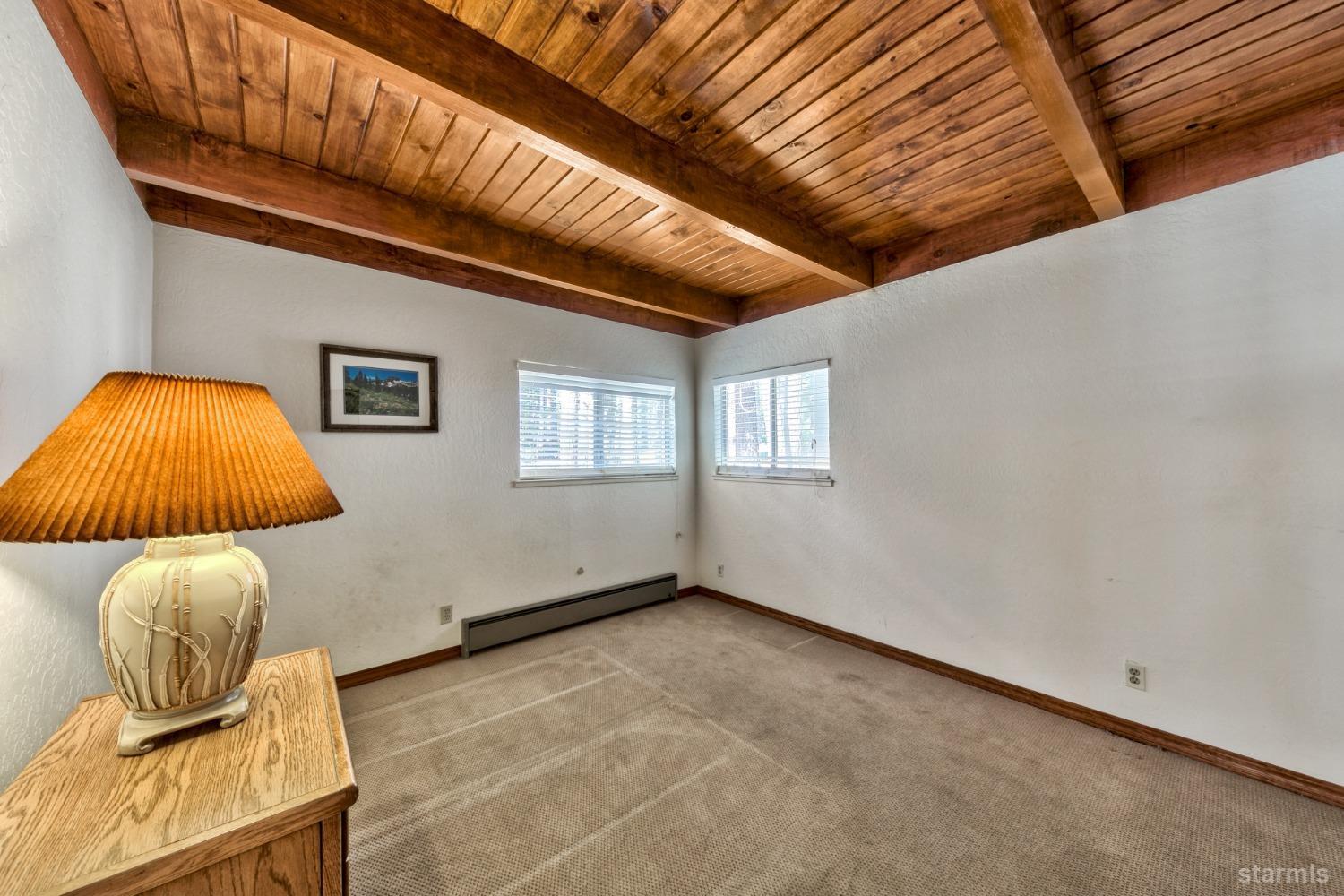 2004 Kickapoo Street South Lake Tahoe, CA 96150 - Photo 16 of 20 a view of a livingroom with furniture and wooden floor