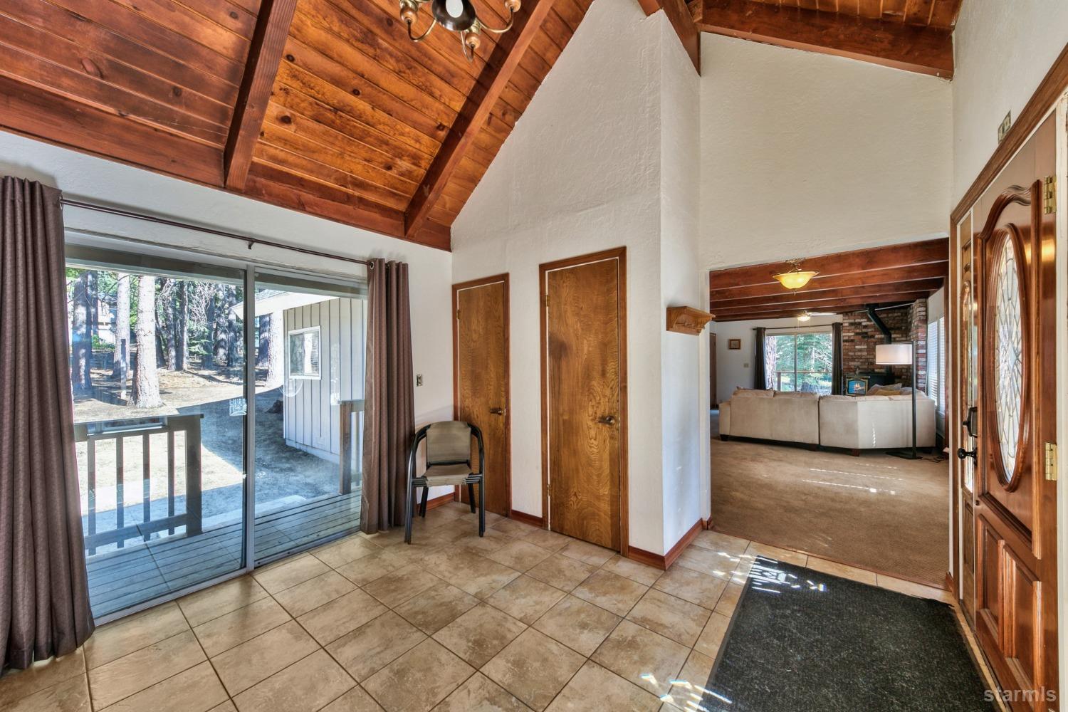 2004 Kickapoo Street South Lake Tahoe, CA 96150 - Photo 17 of 20 a view of a hallway with furniture and entryway