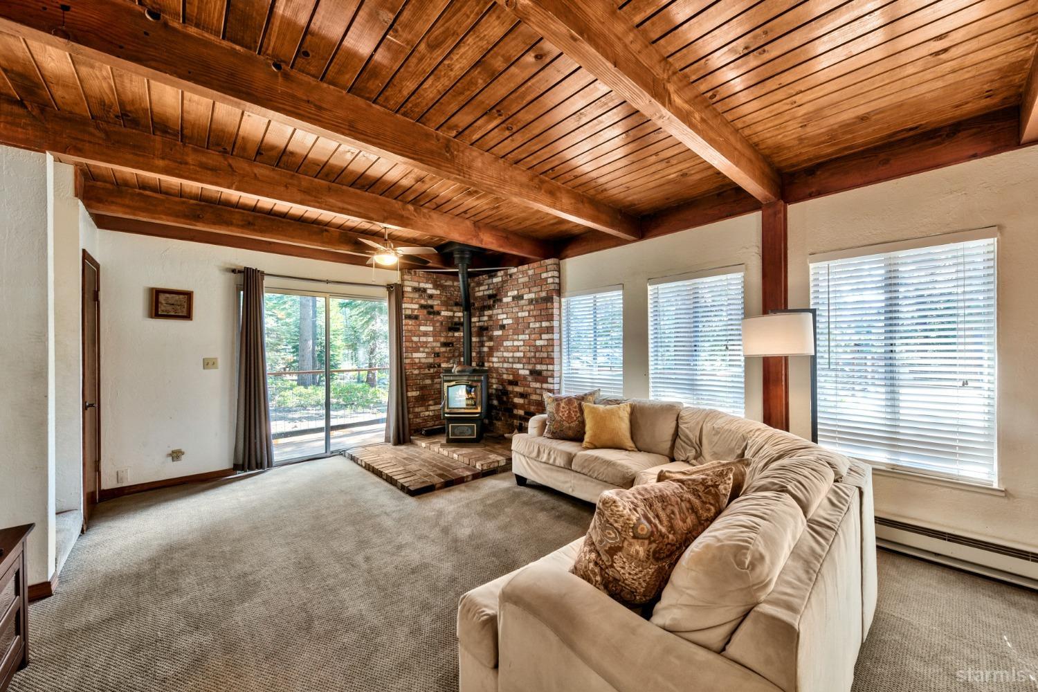 2004 Kickapoo Street South Lake Tahoe, CA 96150 - Photo 6 of 20 a living room with furniture and a large window