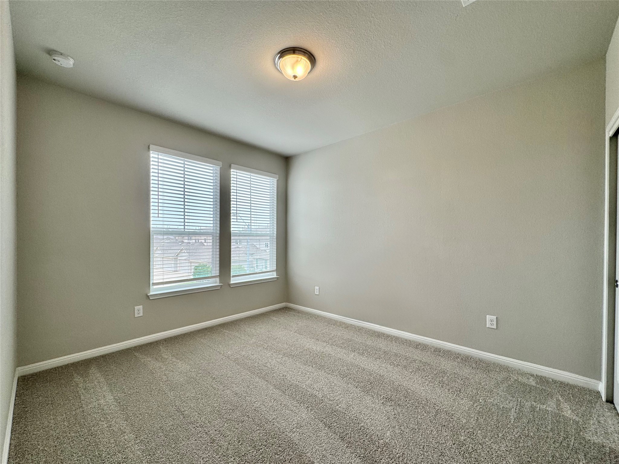 407 Rhetoric Way Pflugerville, TX 78660 - Photo 20 of 38 an empty room with a window