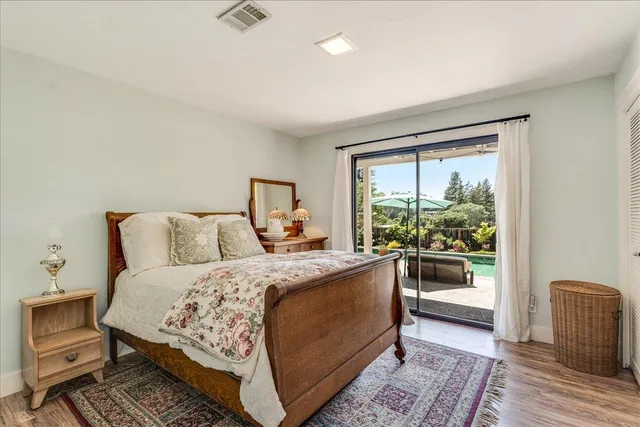 a bed room with a bed and a couch