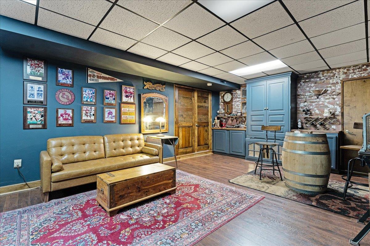 284 Brooktree Ranch Road Aptos, CA 95003 - Photo 25 of 30 a living room with furniture and a rug