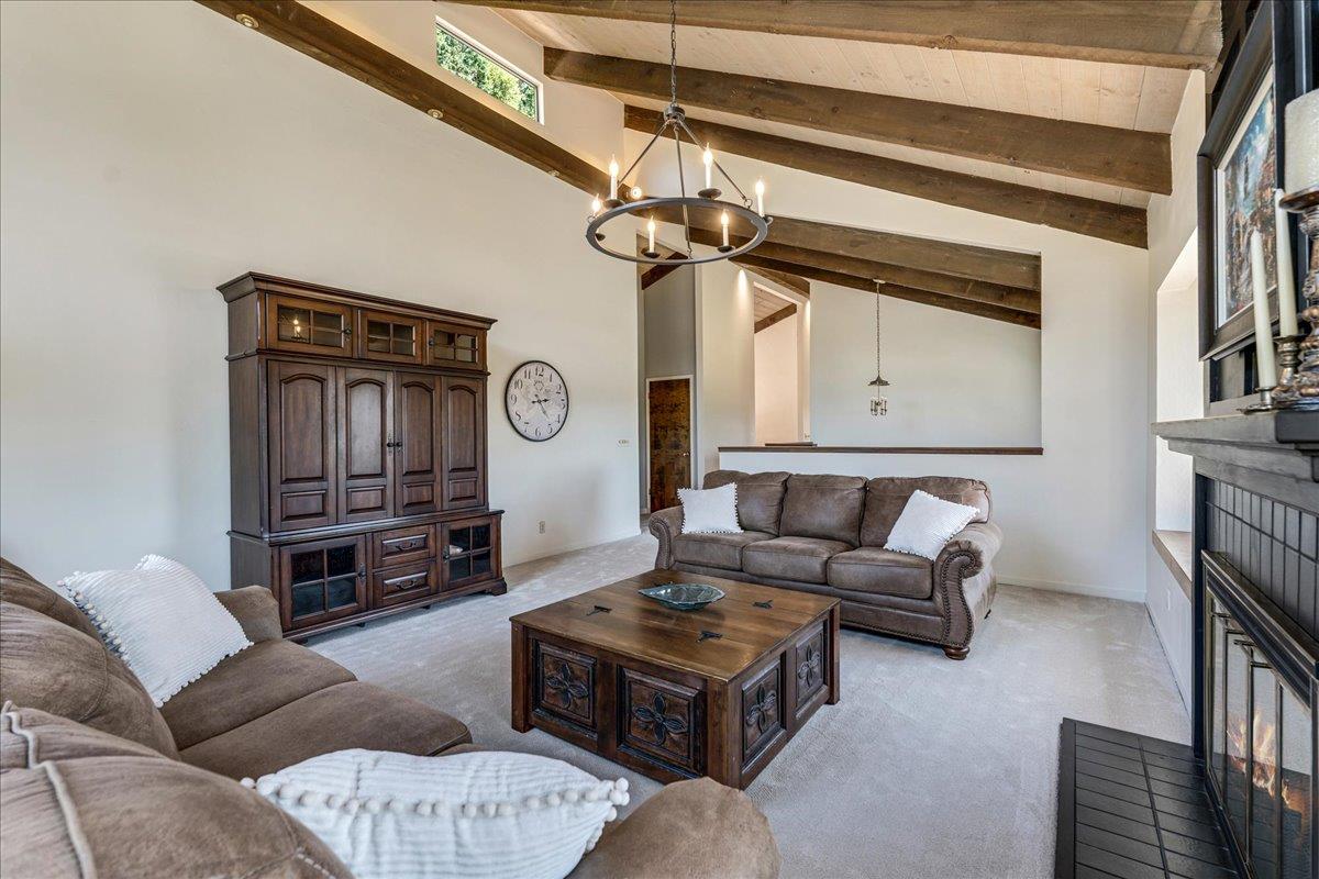 284 Brooktree Ranch Road Aptos, CA 95003 - Photo 4 of 30 a living room with furniture a rug and a window