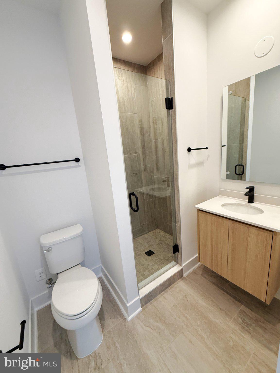 33 Lower Service Court Northwest Washington, DC 20001 - Photo 44 of 51 Sleek modern bathroom with elegant finishes.