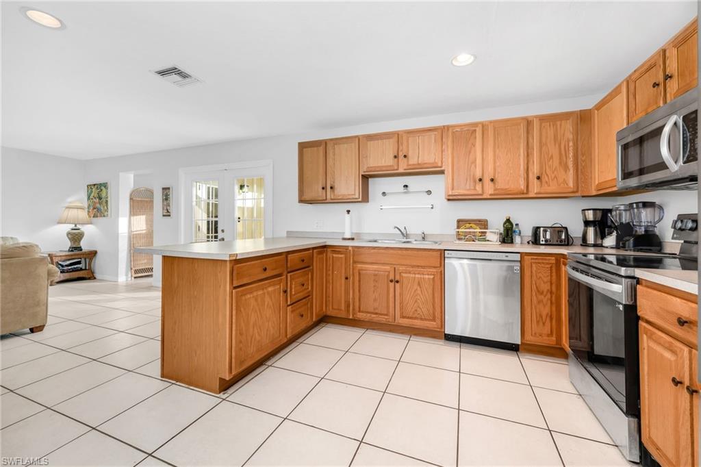 2772 Riverview Drive Naples, FL 34112 - Photo 7 of 33 Unit A - Kitchen
