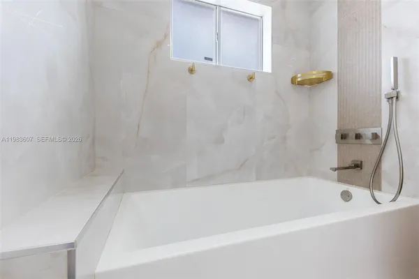 a bathroom with a bathtub
