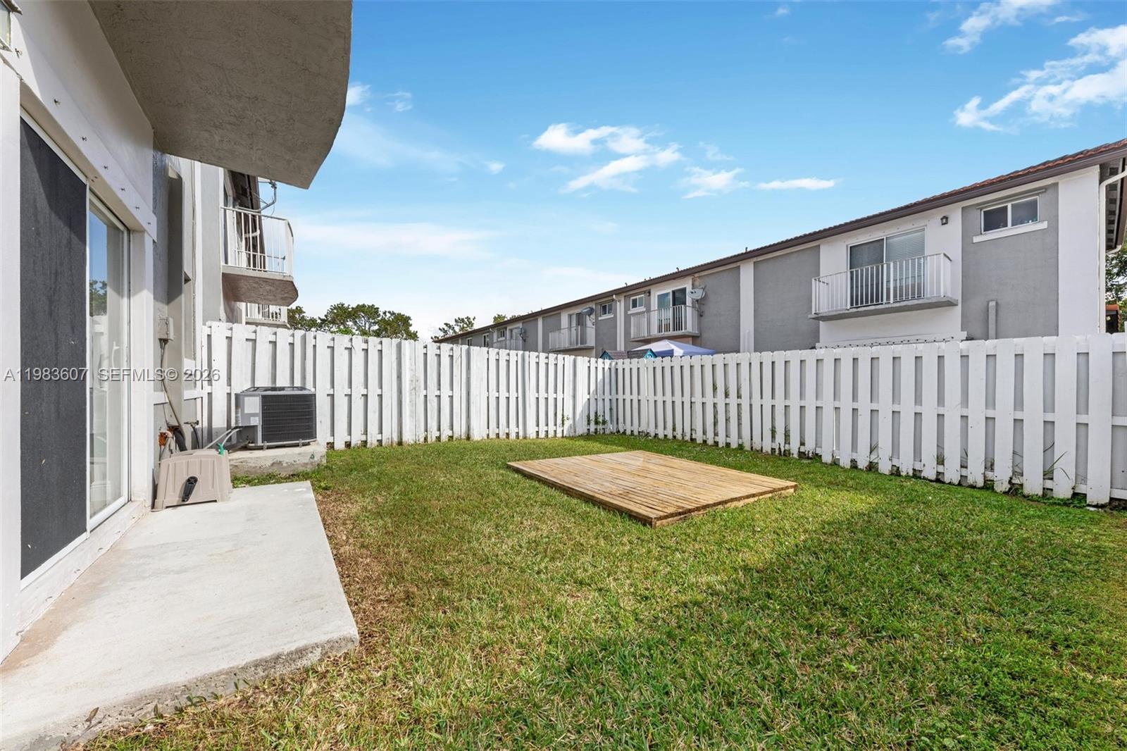 2897 Southwest 129th Way Miramar, FL 33027 - Photo 17 of 22 a view of a backyard