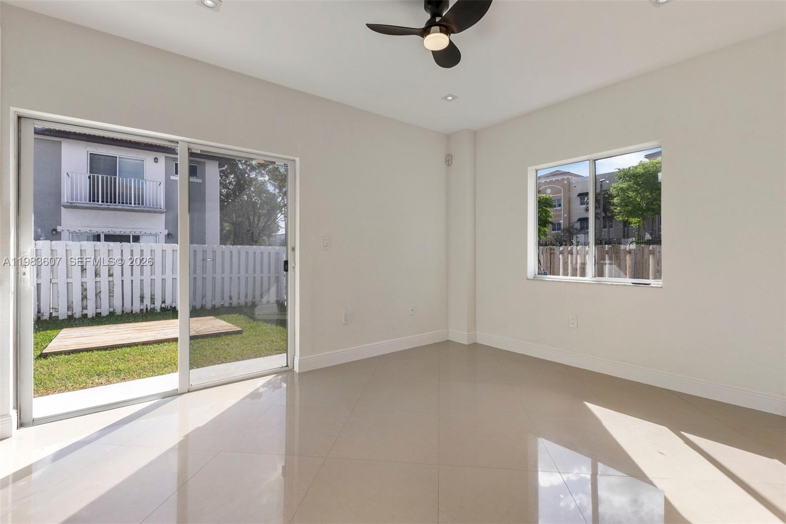 2897 Southwest 129th Way Miramar, FL 33027 - Photo 5 of 22 a view of an empty room with a window