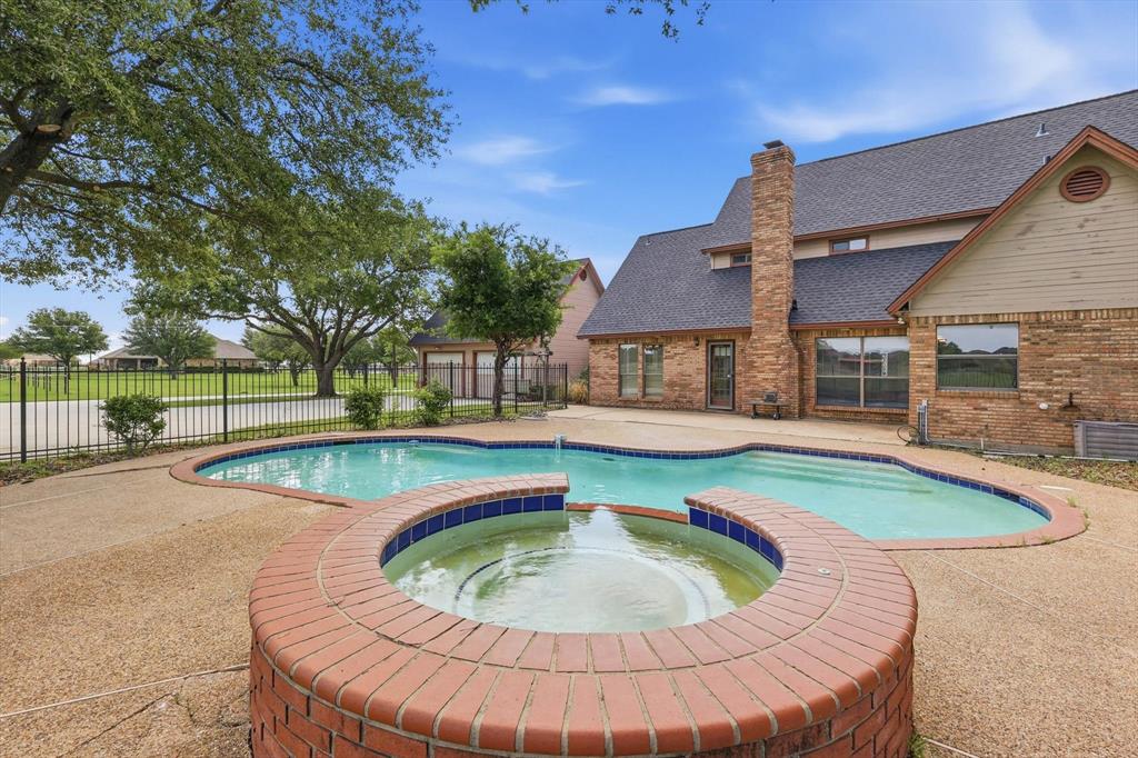 211 Bayne Road Haslet, TX 76052 - Photo 20 of 29 a view of outdoor space yard swimming pool and patio