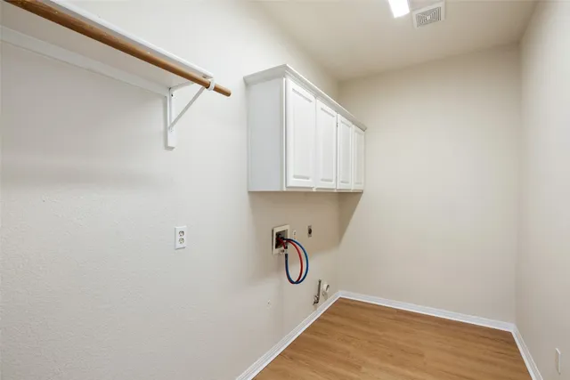 a view of a room with rack on the wall