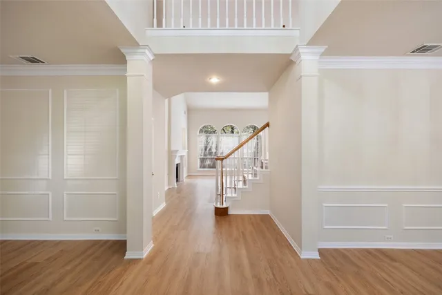 a view of entryway with wooden floor