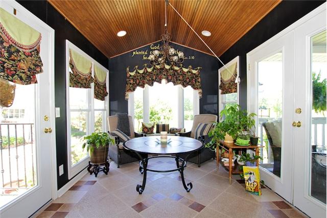 2237 Pleasant View Road Pleasant View, TN 37146 - Photo 13 of 20 SUNROOM WITH BEADBOARD CEILINGS AND CUSTOM TILED FLOOR