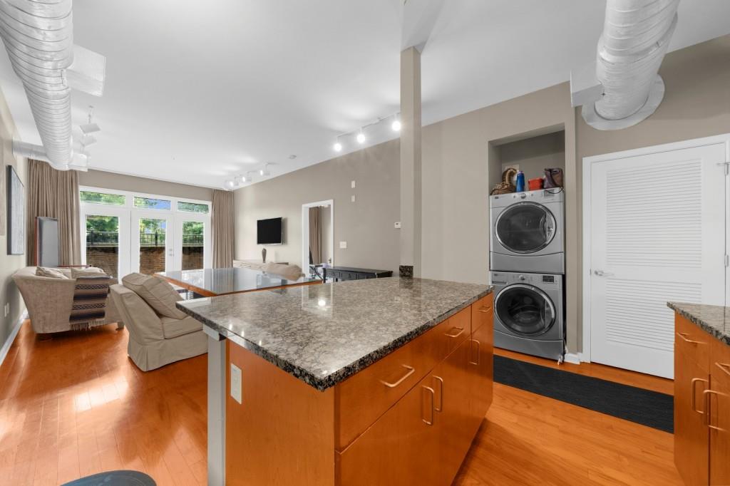 5300 Peachtree Road, Unit 1608 Chamblee, GA 30341 - Photo 12 of 47 a living room with dining table and a couch