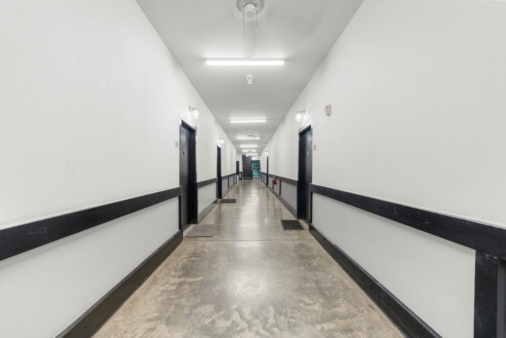 5300 Peachtree Road, Unit 1608 Chamblee, GA 30341 - Photo 32 of 47 a view of a hallway with wooden floor